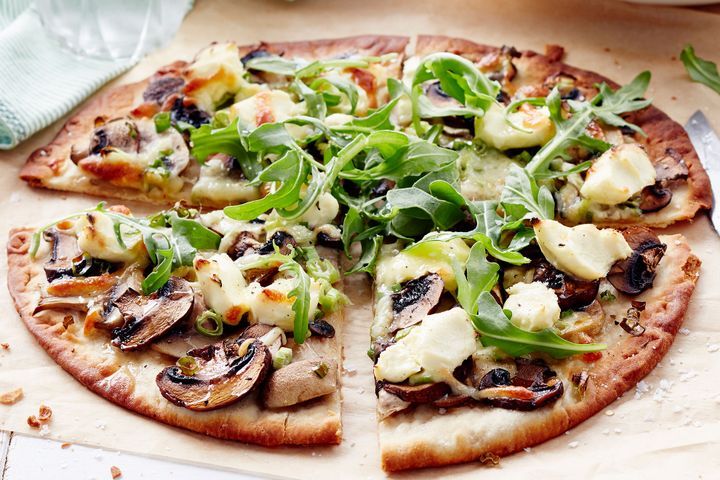 Cooking Vegetarian Mushroom and cream cheese pizza