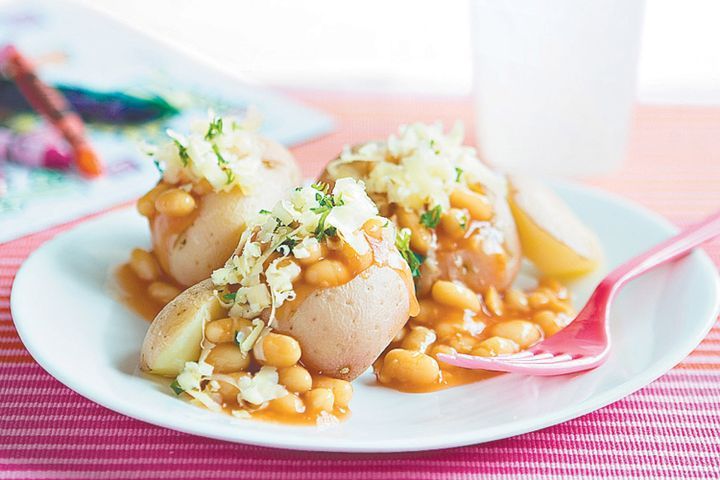 Cooking Vegetarian Potatoes topped with baked beans