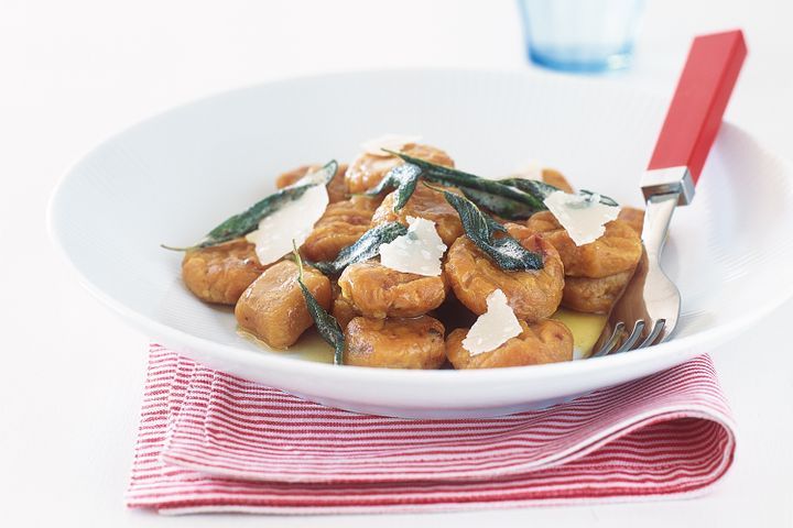 Cooking Vegetarian Pumpkin gnocchi with butter and sage