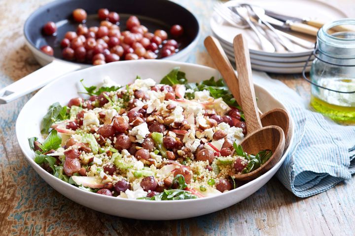 Cooking Vegetarian Quinoa salad with roasted grapes and feta