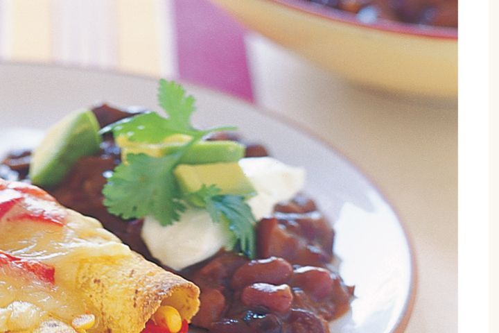 Cooking Vegetarian Refried chilli beans with avocado