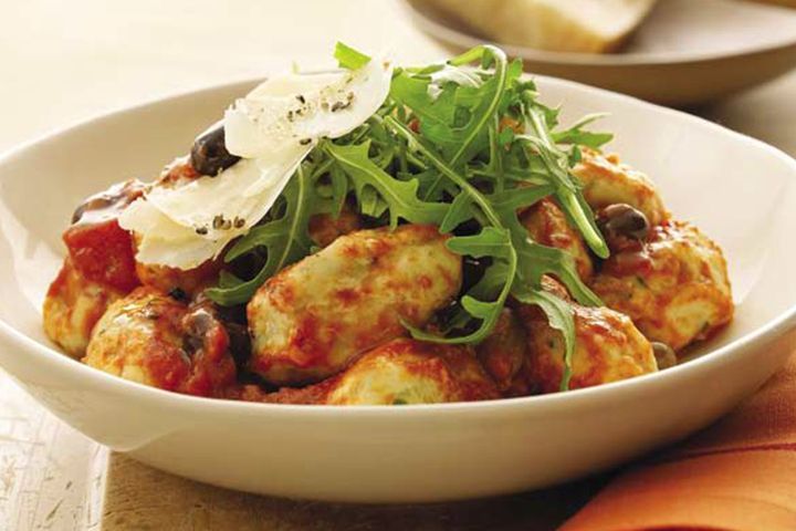 Cooking Vegetarian Ricotta & rocket gnocchi with warm tomato olive sauce