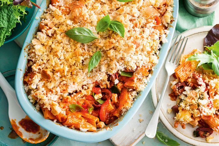 Cooking Vegetarian Rigatoni pasta bake with garlic bread topping