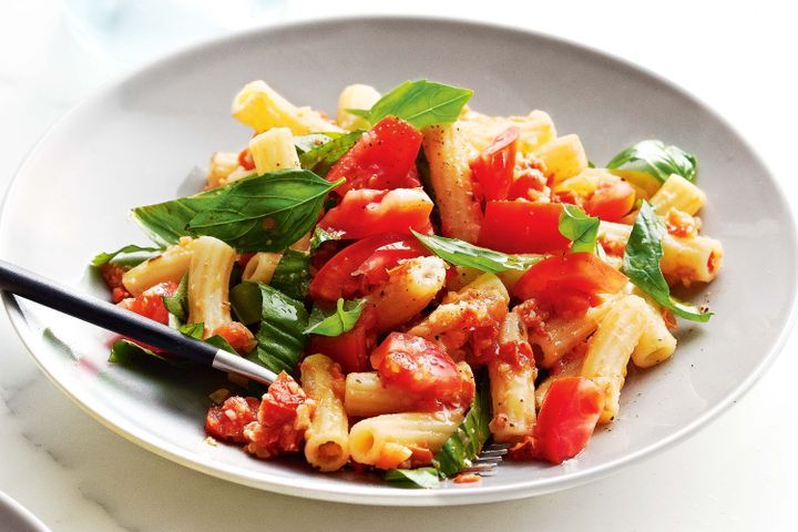 Cooking Vegetarian Rigatoni with roast tomato and macadamia pesto