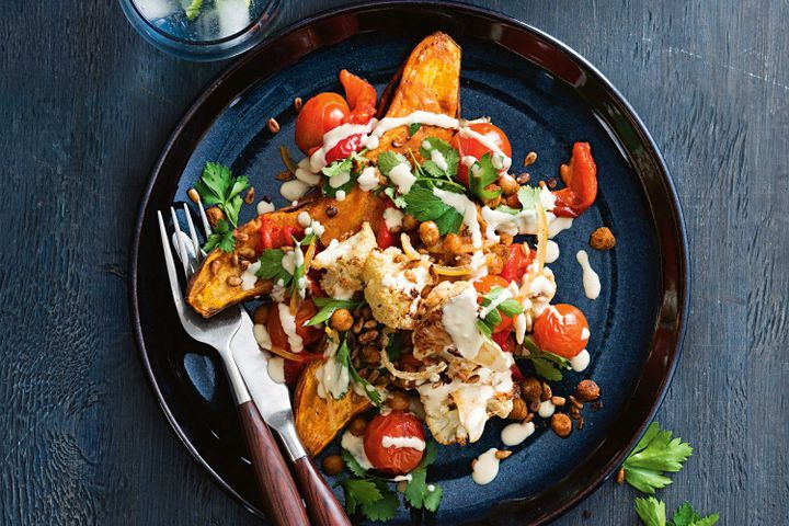 Cooking Vegetarian Roasted sweet potato with caramelised garlic and spiced chickpeas