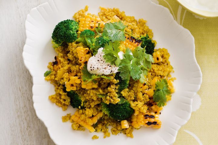 Cooking Vegetarian Spiced quinoa pilaf with corn and broccoli