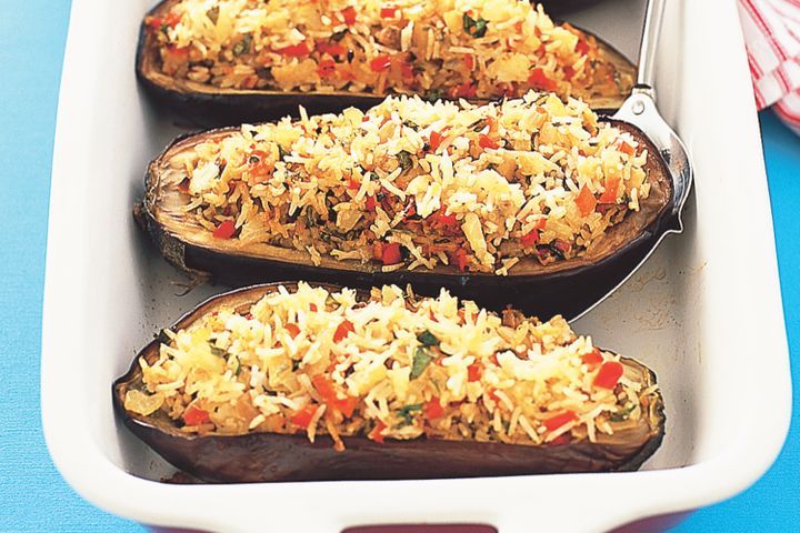 Cooking Vegetarian Spicy rice-filled eggplant