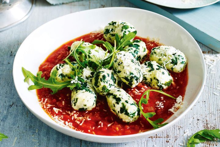 Cooking Vegetarian Spinach and ricotta gnocchi with chilli tomato sauce