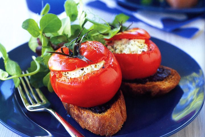 Cooking Vegetarian Tomatoes stuffed with goats cheese (vegetarian)