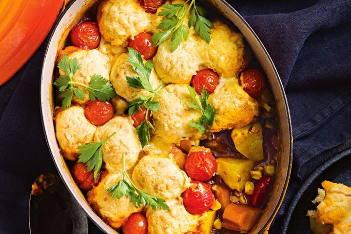 Cooking Vegetarian Vegetable casserole with smoked cheddar dumplings