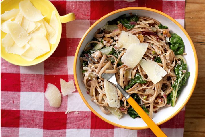 Cooking Vegetarian Wholemeal pasta with silverbeet and walnuts