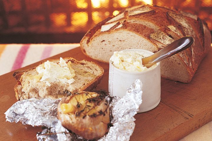 Cooking Vegetarian Wood-roasted garlic with soft cheese and bread