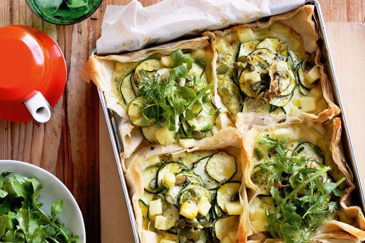 Cooking Vegetarian Zucchini, haloumi and herb tarts