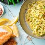 Almond crumbed chicken schnitzel with herb buttered spaghetti