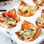 Baked egg cups with prosciutto, gruyere and truffle oil