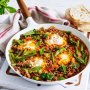 Baked eggs in spicy beef sauce