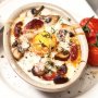 Baked eggs with spinach, mushrooms, goats cheese and chorizo