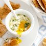 Baked eggs with wilted kale and feta with dukkah pita crisps