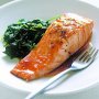 Baked maple-glazed salmon with wilted spinach