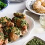 Barbecued chicken with pesto and hassleback potatoes