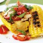 Barbecued corn with tomato and almond salad