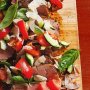 Barbecued pork fillet with coconut, cucumber & tomato salad