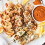 BBQ seafood skewers with romesco sauce