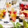 Berry sangria with passionfruit ice cubes