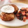 Brunch rissoles with poached eggs and tomato salad