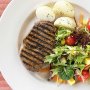 Cajun-spiced beef with baby potatoes and salad