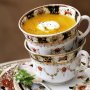 Carrot and coriander soup with yoghurt swirl