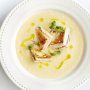 Cauliflower soup with blue cheese and ham sandwich croutons