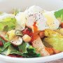 Chicken Caesar salad with poached egg
