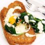 Eggs in bread with wilted spinach and hollandaise