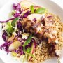 Ginger and tamari pork skewers with cabbage, apple and herb salad