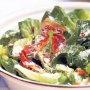 Green salad with prosciutto shards