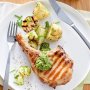 Grilled pork cutlets with rocket and almond pesto