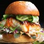 Miso fish burger with  pickled cucumber and slaw