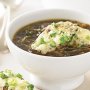 Mixed onion soup with green onion croutes