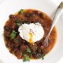 Pan-fried beans with poached egg and parsley