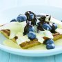 Pear & blueberry waffles with chocolate sauce and custard