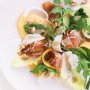 Persimmon and prosciutto salad with walnut dressing