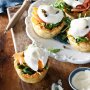 Poached eggs and salmon in potato rosti baskets