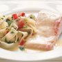 Poached salmon with beurre blanc sauce and fettuccine