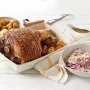 Pork leg roast with cabbage and apple salad, baby chat potatoes and gravy