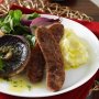 Pork sausages with mushrooms and herb butter