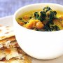 Pumpkin, chickpea & spinach dhal with garlic & herb naan