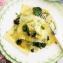 Ricotta and herb ravioli with spinach and pine nuts