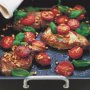 Roast pork steaks with tomatoes and pine nuts