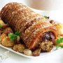 Roast pork with pistachio stuffing & hasselback potatoes